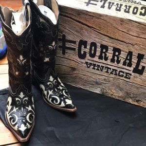 Cow and lizard cowgirl boots.